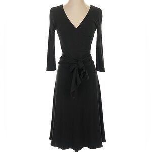 BCBG Maxazaria women’s dress. Black. Slinky material. Size MP